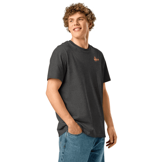 Man wearing a dark gray Spain Futbol Shirt with flag-inspired text and blue jeans